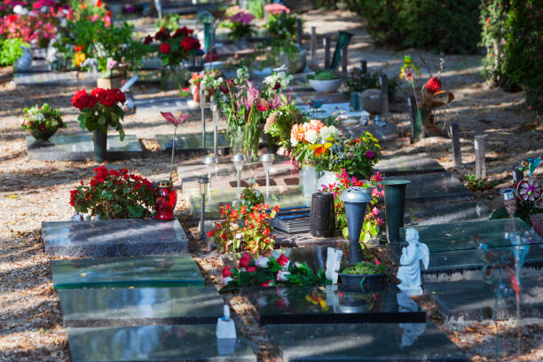 Tombstones with flowers on a cemetery