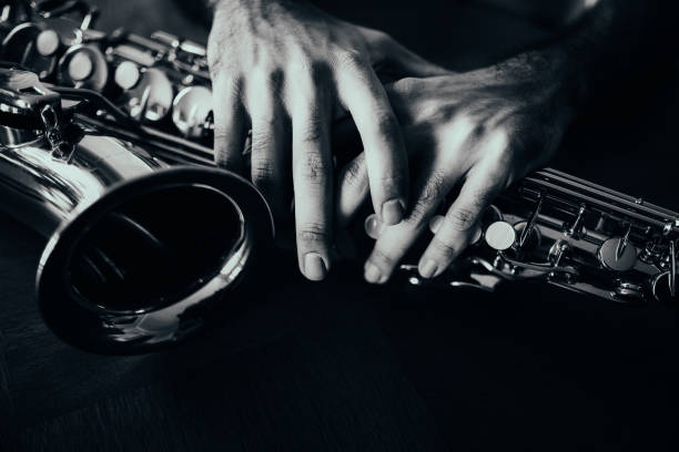 istock The hands of the saxophone player 1272994746