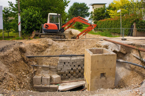 istock Sewer Well and Compact Crawler Excavator 1273002067
