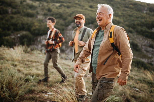 istock Three generations males on hiking tour 1273003287