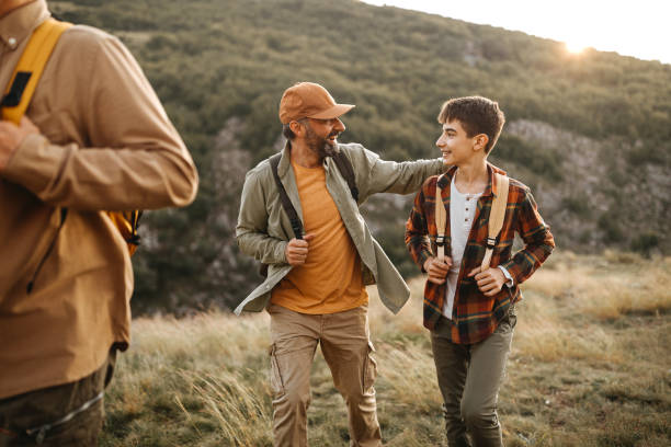 istock Father with son enjoying hiking tour 1273003419