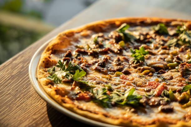 istock Delicious freshly baked Italian pizza 1273003466