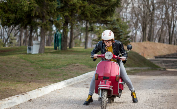 istock Urban girl on vespa 1273003711