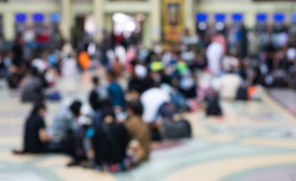 istock Blurring of crowd sitting in waiting station. 1273003869