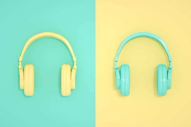 Headphones with laptop on wooden table