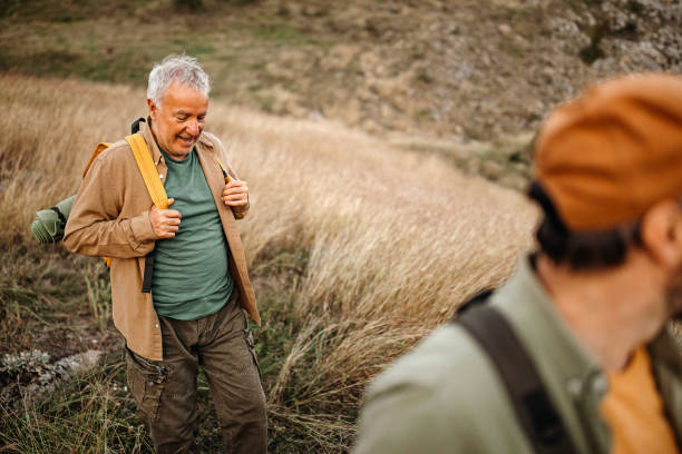 istock Elderly father with adult son on a picnic 1273009669