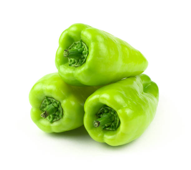 istock Fresh, ripe, green bell peppers on a white background. 1273010405