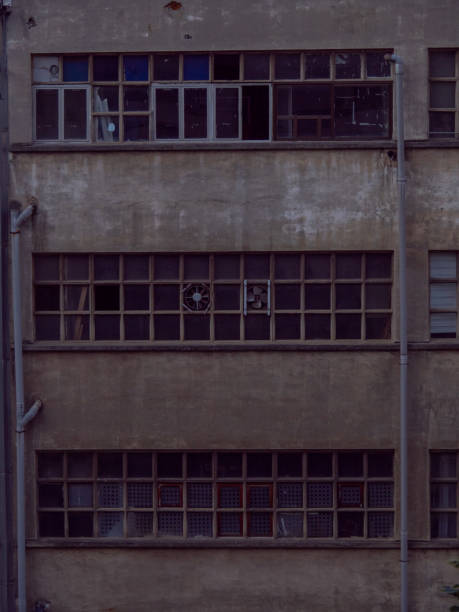 istock windows of abandoned factory in bilbao, some windows are broken 1273010674