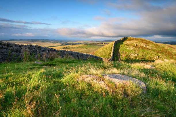 Hadrians Wall Trig Point on Winshield Crags Hadrian's Wall is a UNESCO World Heritage Site in the beautiful Northumberland National Park, popular with walkers along the Hadrian's Wall Path and Pennine Way pennines photos stock pictures, royalty-free photos & images