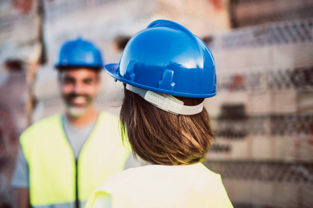 istock working woman helmet detail 1273015574