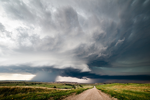 Supercell storm with dramatic clouds over the Badlands in South Dakota.