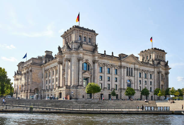 istock Reichstag building next to the river Spree in Berlin 1273018524
