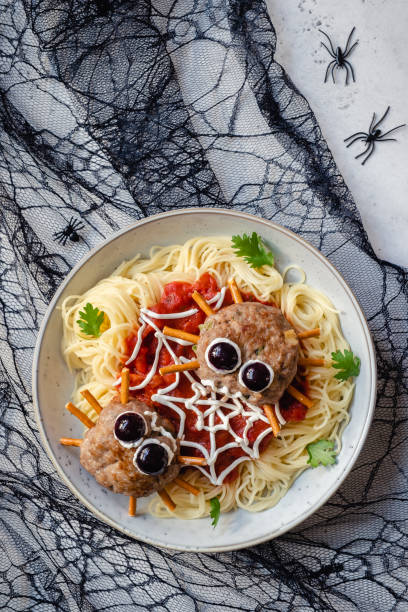 istock Cutlet look like a spider with pasta 1273030788