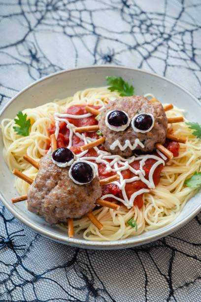 istock Cutlet look like a spider with pasta 1273041404