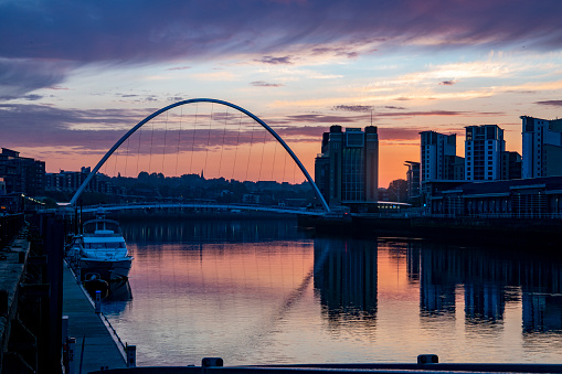 The bridges between Gateshead and Newcastle-upon-Tyne on the River Tyne with a stunning late summer sunrise.