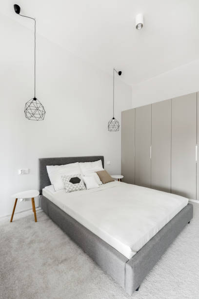 istock White bedroom with gray carpet 1273062186