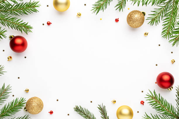 istock Christmas frame with fir tree branches and festive decoration at white background. Christmas flat lay with space for text. 1273070932