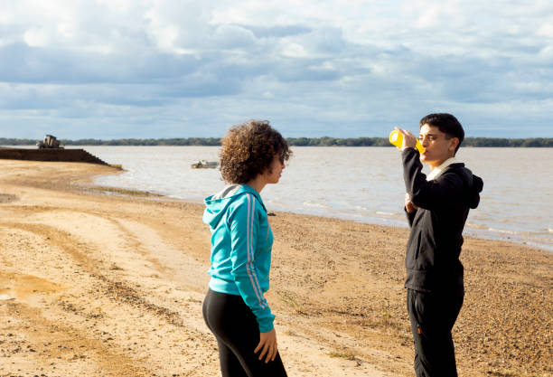 istock young people playing riverside sport 1273082608