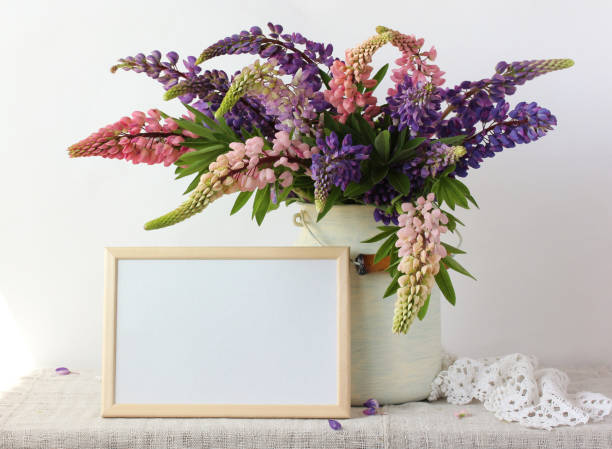 istock bouquet of pink and purple peonies and an empty rectangular frame 1273094585
