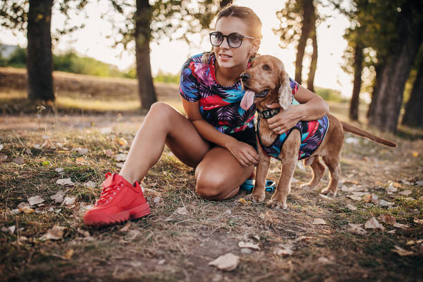istock One woman having with her cocker spaniel dog outdoors 1273103013