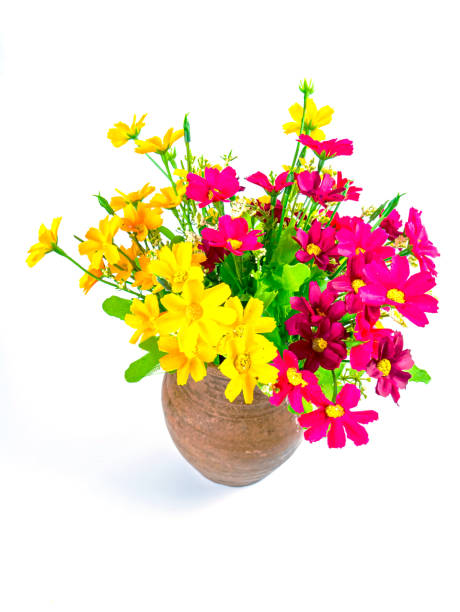 istock A bouquet of artificial flowers in a clay jug. 1273103128