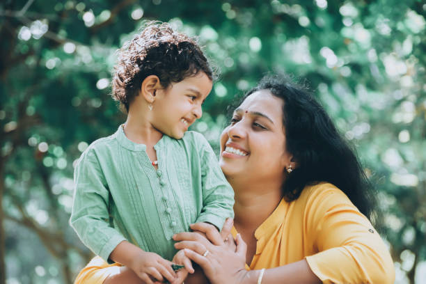 istock Mother And Daughter In Park 1273113542