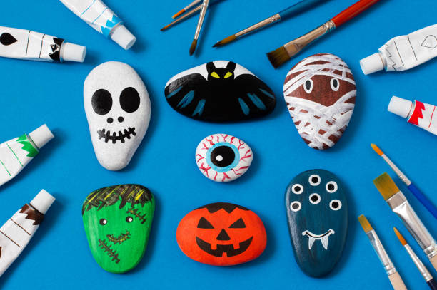 Drawing on stones Halloween characters stock photo