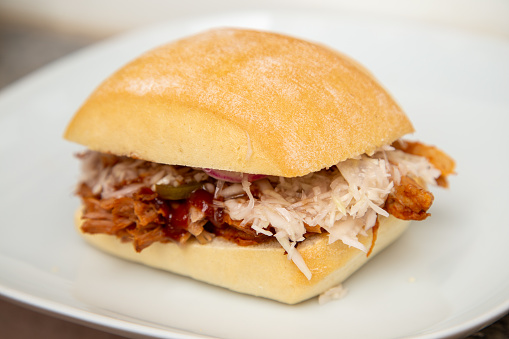 Pulled pork with coleslaw in a bun