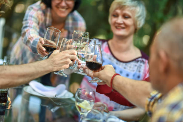 istock Close up of toasting with drinks 1273166850