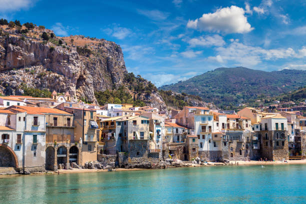 istock Sandy beach in Cefalu in Sicily 1273167500