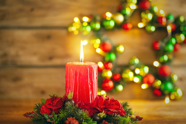 istock Burning Christmas red candle 1273168550