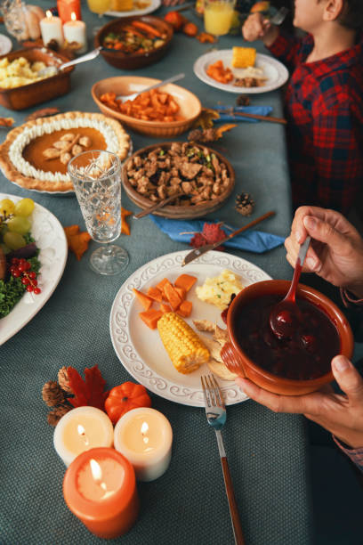 istock Family Having Traditional Holiday Stuffed Turkey Dinner 1273172465