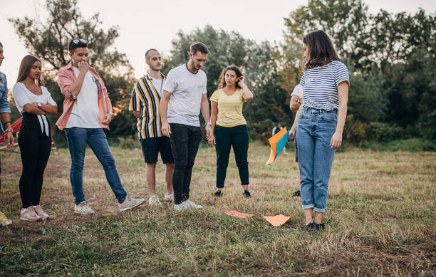 istock Group of young people having fun on team building in nature 1273180285