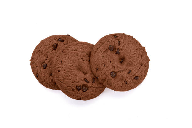 istock Wheat flour cookies with chocolate chips on white background. 1273192667