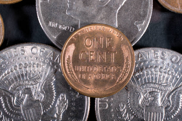 istock US wheat penny close up on half dollar coins 1273192929
