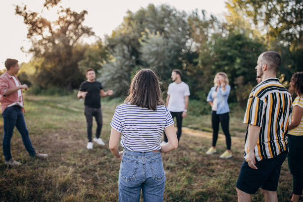 istock People on a team building seminar outdoors 1273194028