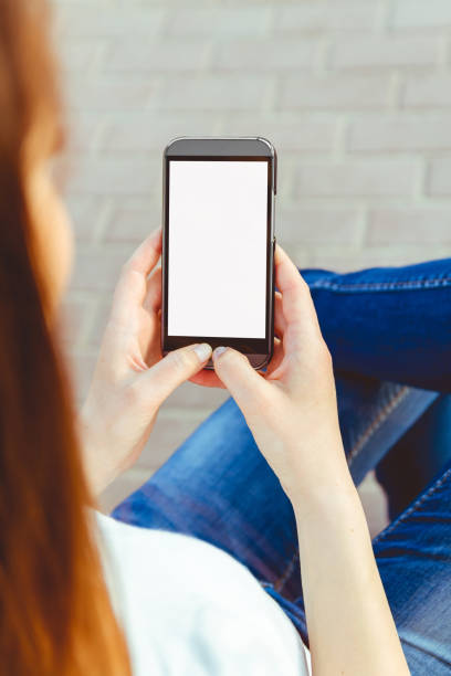 istock Girl with phone in hand 1273194222