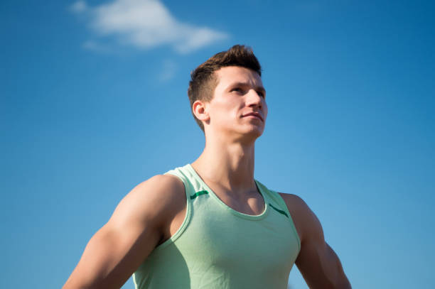 istock Athlete in green tshirt on sunny day 1273195588