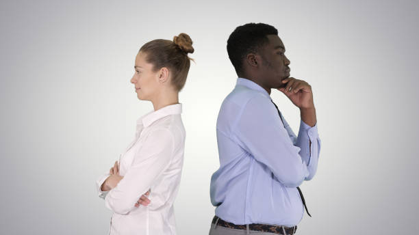 istock Beautiful and handsome guy standing back to back changing poses 1273202627