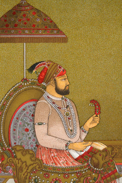 Indian man of the court of the Mughal emperor Vintage illustration of Indian man of the court of the Mughal emperor mughal empire stock illustrations