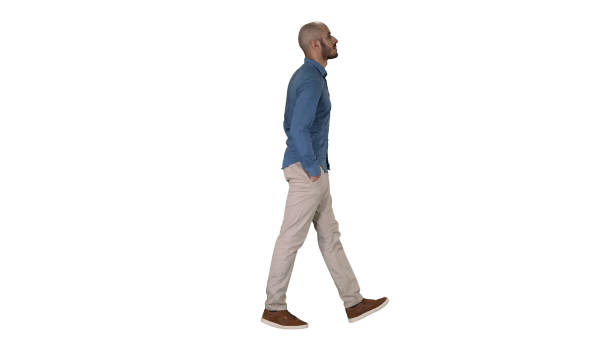 istock Confident in his style model walkin with hands in pockets on white background 1273204723