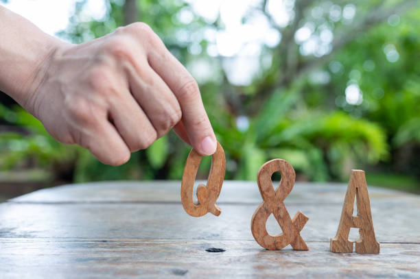 istock Question and Answer on  wooden latter for use in discussion, consultation, seminar 1273204819
