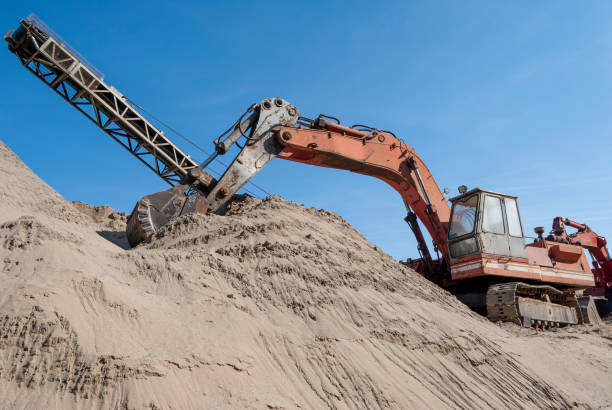 istock Old excavator waiting for a new day 1273210493