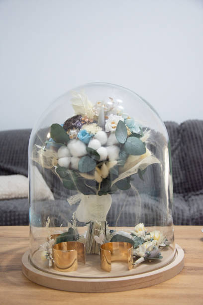 istock bridal bouquet in glass globe 1273210750