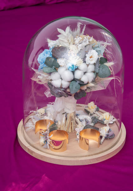 istock bridal bouquet in glass globe 1273210806