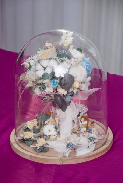 istock bridal bouquet in glass globe 1273211394
