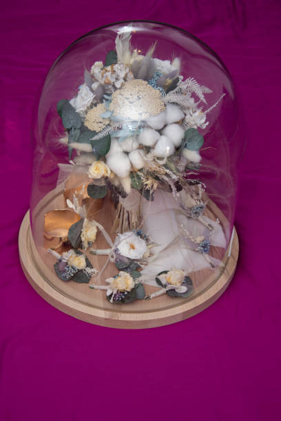 istock bridal bouquet in glass globe 1273211444