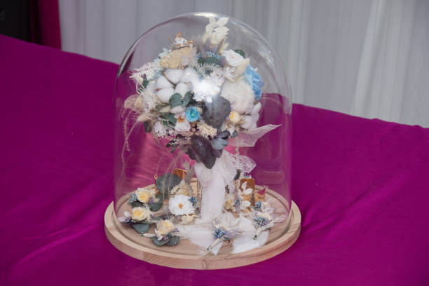 istock bridal bouquet in glass globe 1273211458