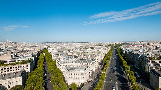 Paris : aerial view on Champs Elysees avenue and Friedland avenue, with background Sacré Choeur