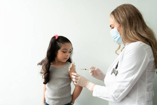 istock Little girl getting a vaccine 1273213670